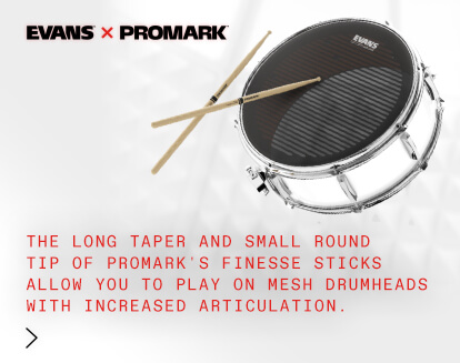 Drumsticks hitting drum