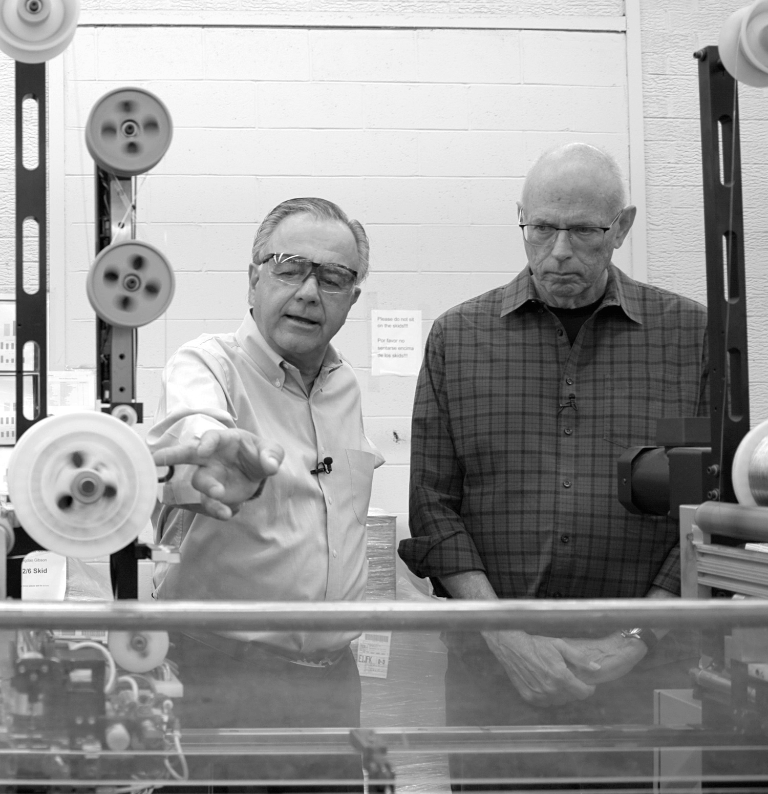 Jim D'Addario and Bob Taylor in the D'Addario string factory