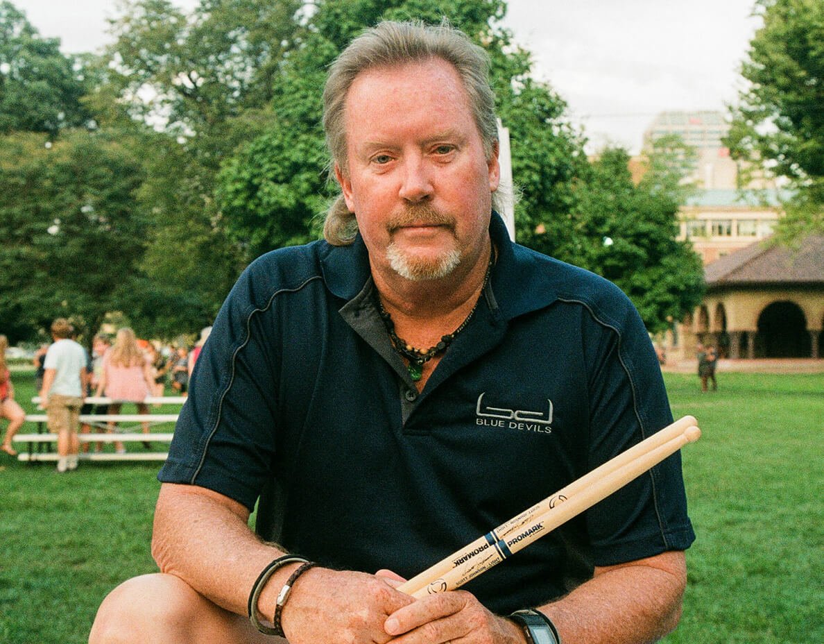 Scott Johnson holding sticks